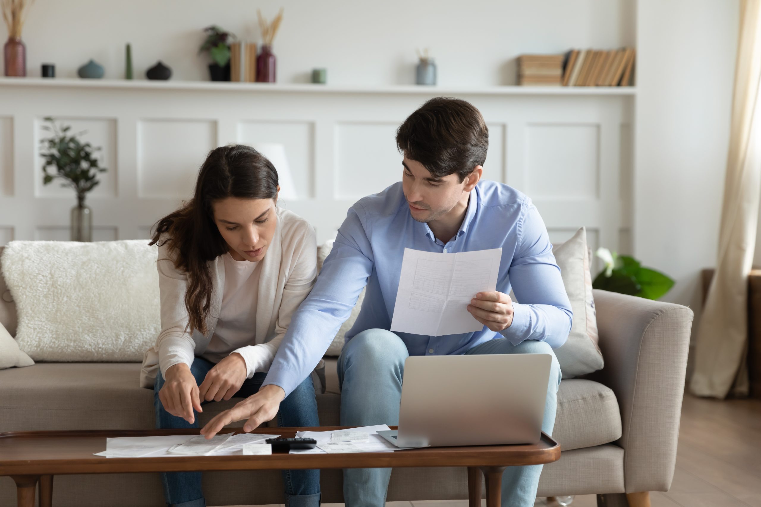 couple discussing closing costs