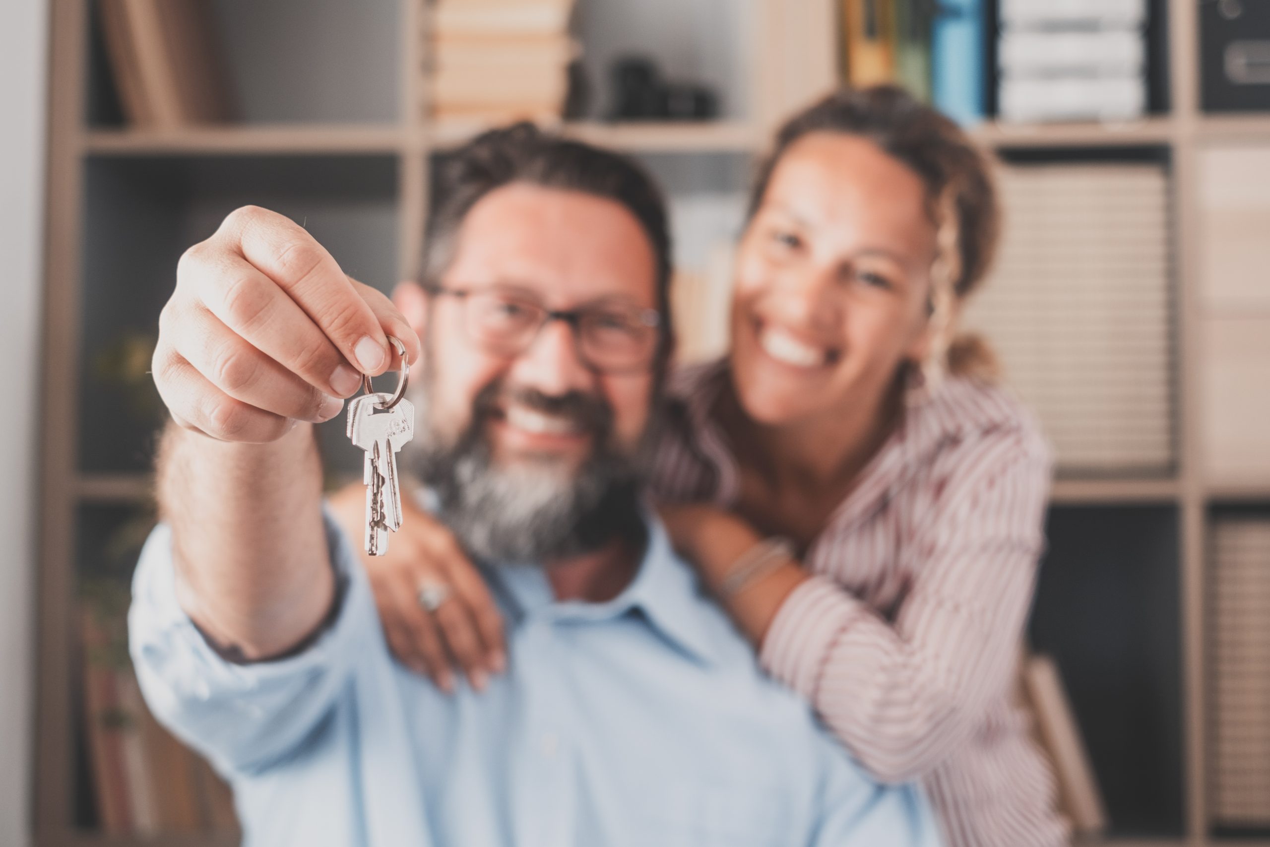 homeownership in 2022 | young couple holding keys