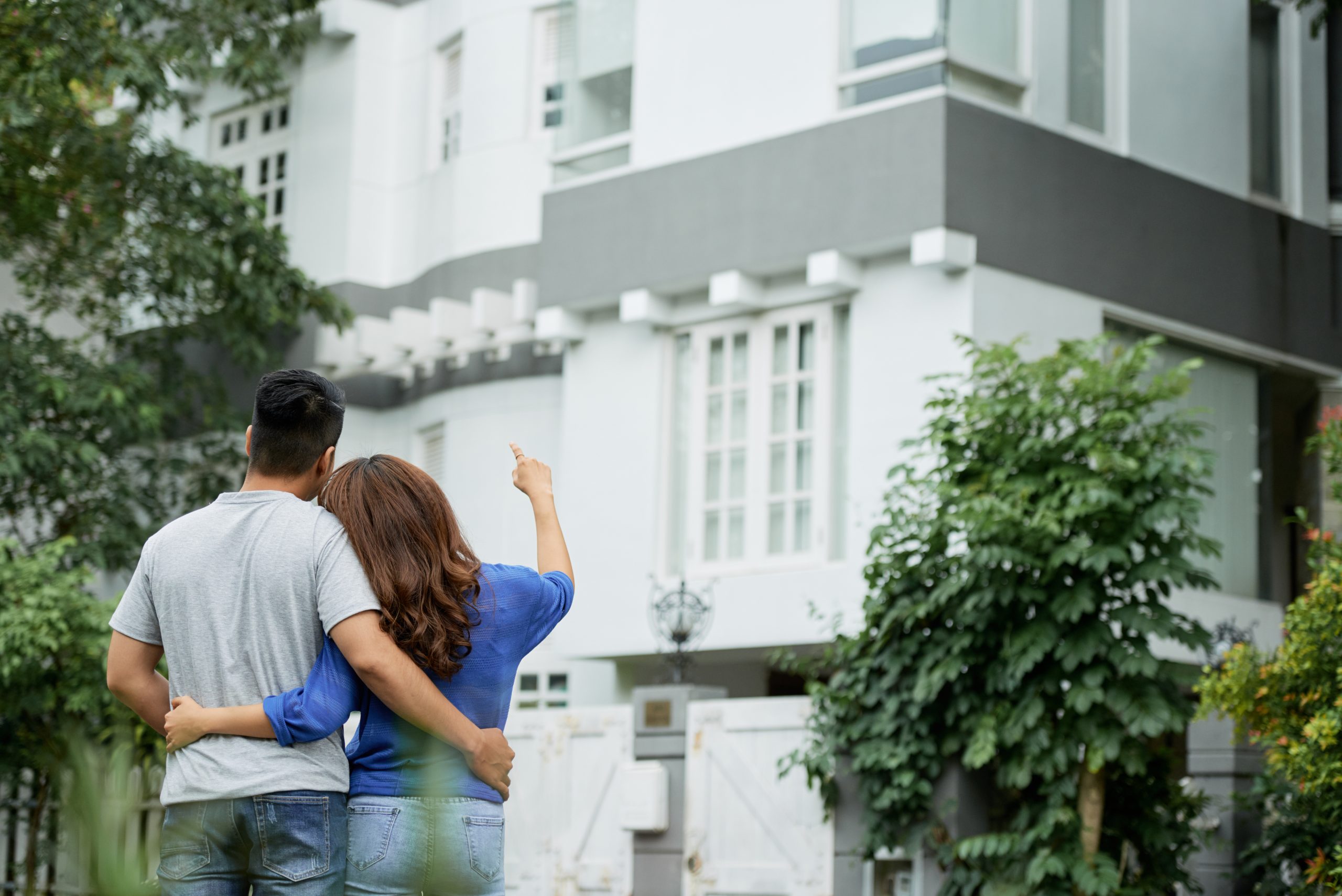 couple applying for a mortgage looking at house