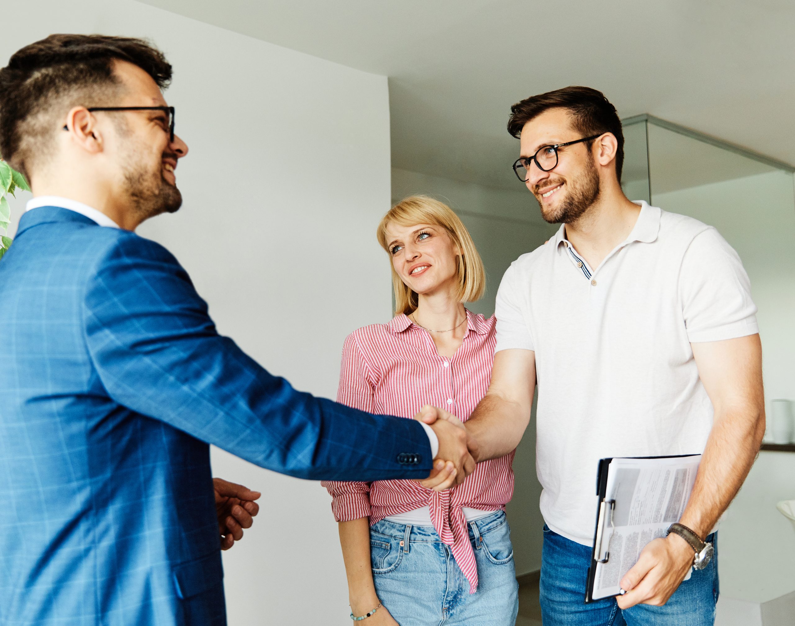 couple signing house that has passed fha minimum property standards